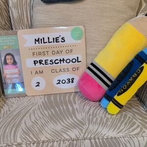 Pink and Yellow Crayon Plush Toy And First Day Of School Dry Erase Board